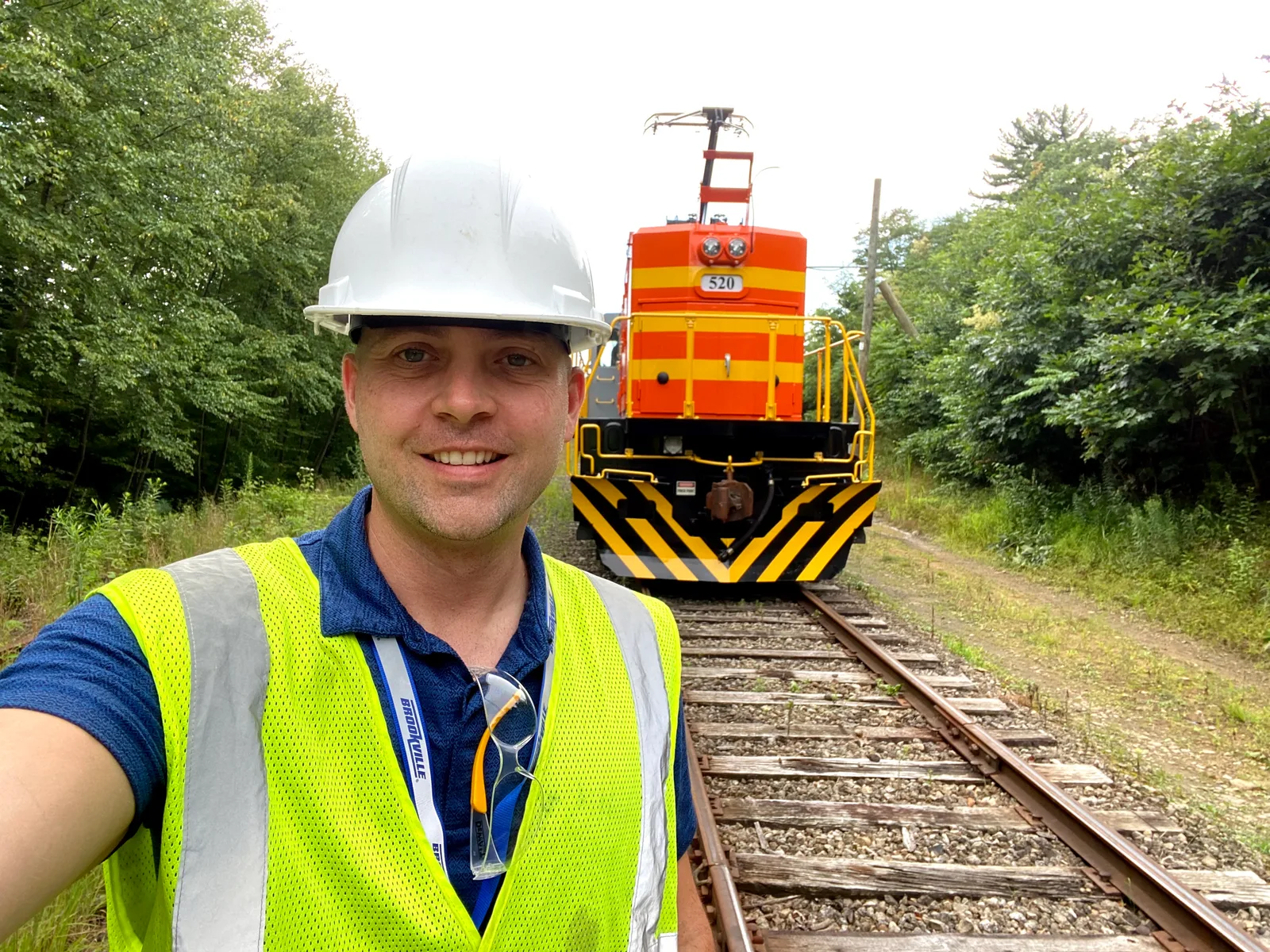 Our principal engineer with a locomotive on the Brookville test track